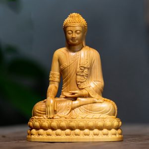 Statue bouddha dans du bois